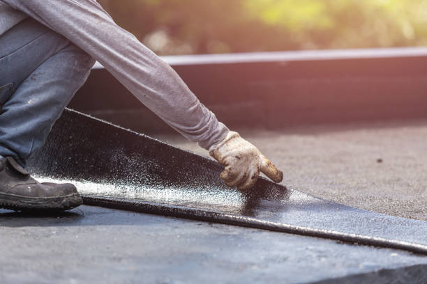Professional Waterproofing technician working in Lansing, MI